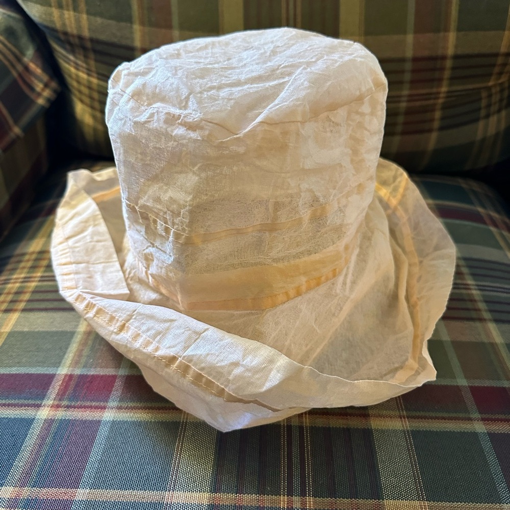 Elegant Peach-colored Hat